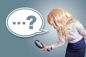 虫眼鏡で疑問を探している